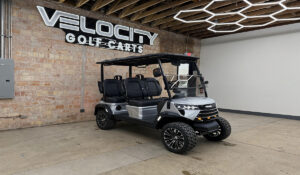 Silver Lining Voyager Commander 4 seater forward-facing golf cart with black seats and Eco lithium battery, lifted with independent suspension and four-wheel disc brakes at Velocity Golf Carts in Salt Lake City, Utah