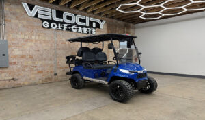 Deep Sea Blue Voyager Patriot 4 passenger golf cart with black seats, 72-volt Eco lithium battery, independent suspension, four-wheel disc brakes, lifted suspension, Apple CarPlay, and aluminum frame at Velocity Golf Carts in Salt Lake City, Utah